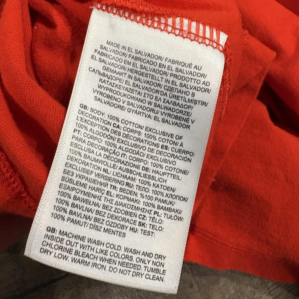 The North Face Shirt Mens Medium Orange Long Sleeve Graphic Circular Design